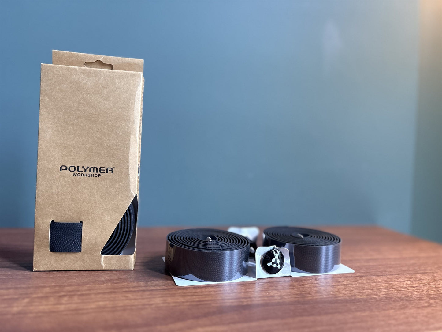 Polymer Workshop handlebar tape — rolls, finishing plugs and kraft packaging