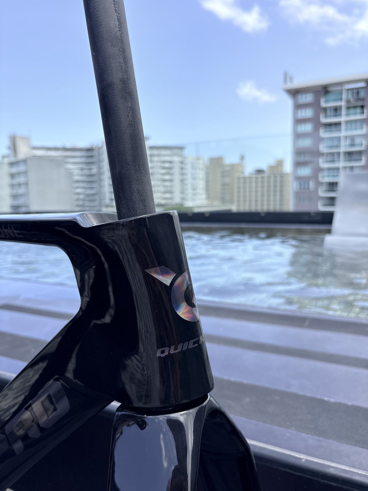 Colorway: Midnight Dark — head tube with holographic Q badge